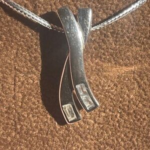 Ribbon Shaped Elegant Silver Pendant with Zirconia